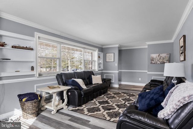 living room featuring hardwood / wood-style flooring and ornamental molding