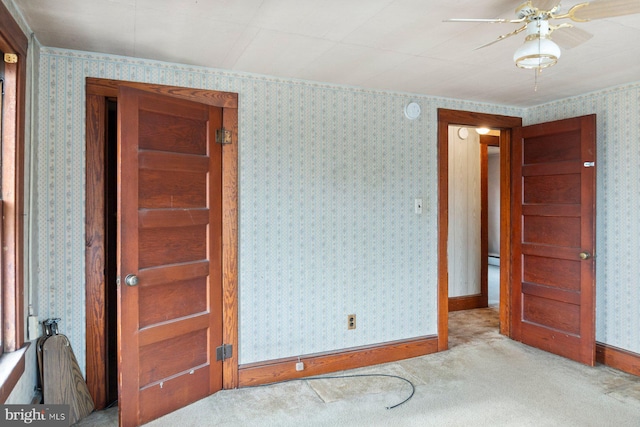 unfurnished bedroom featuring light colored carpet