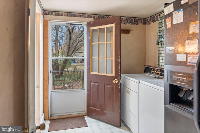 laundry area with independent washer and dryer