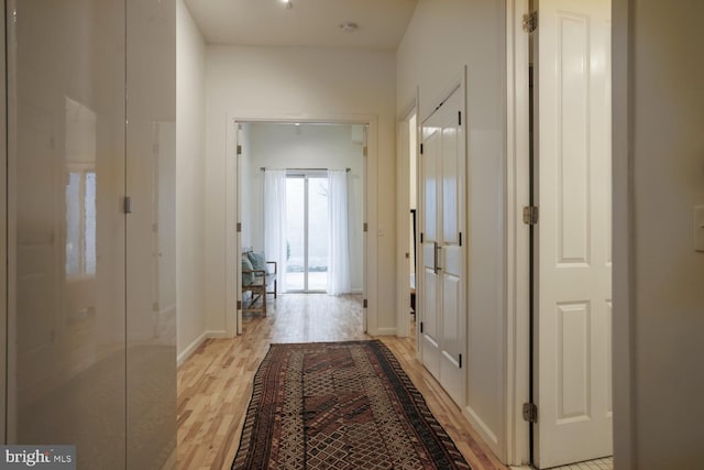 hallway featuring light hardwood / wood-style floors