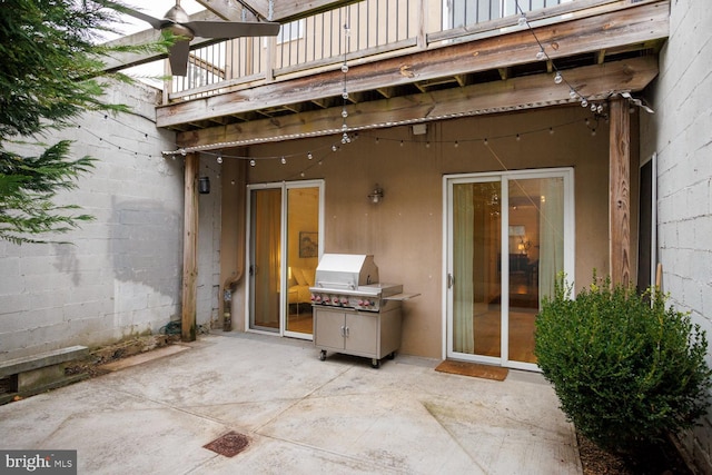 view of patio featuring a balcony