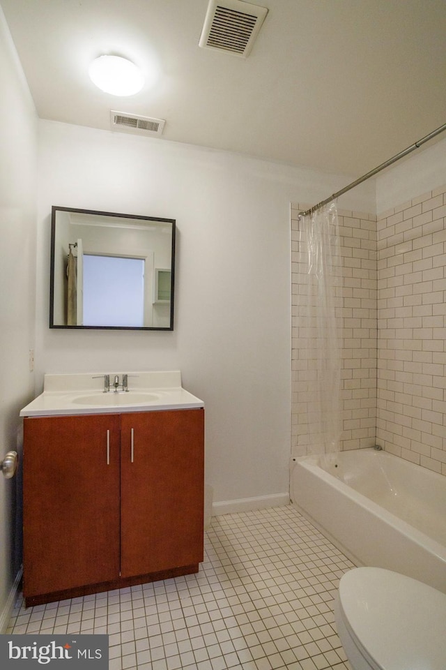 full bathroom with vanity, tile patterned flooring, shower / bath combination with curtain, and toilet