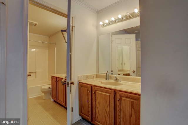 full bathroom featuring ornamental molding, vanity, shower / bathtub combination, and toilet