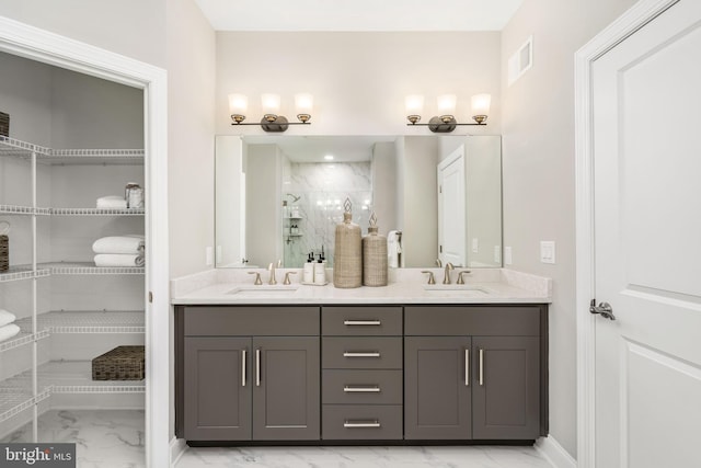 bathroom with vanity and walk in shower