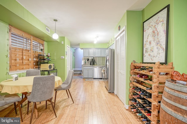 dining space featuring light hardwood / wood-style flooring