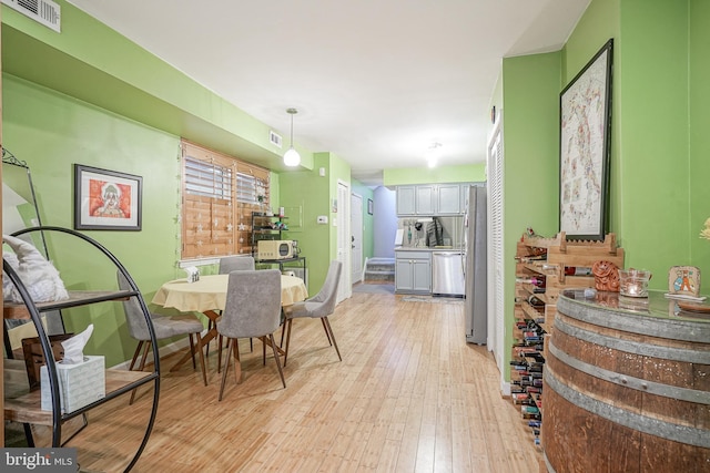 dining area featuring light hardwood / wood-style flooring