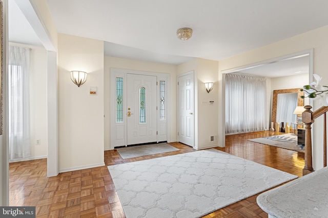 entrance foyer with parquet floors