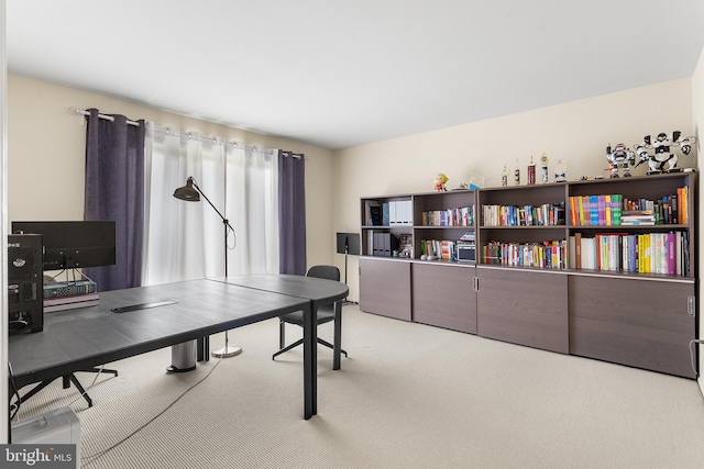 view of carpeted office space