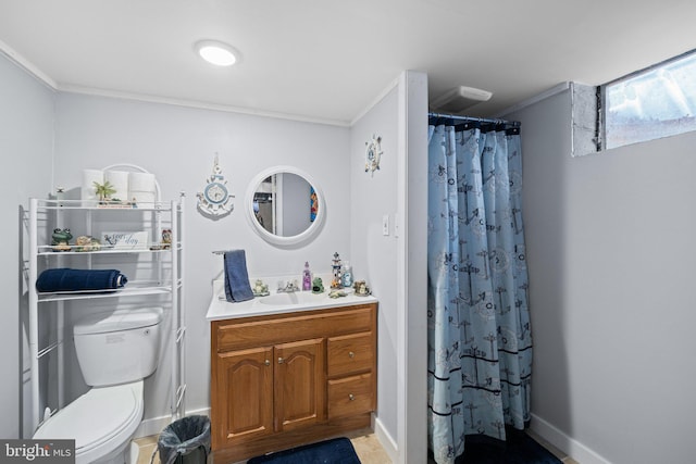 bathroom with vanity, crown molding, curtained shower, and toilet