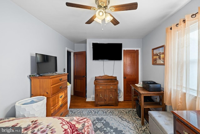 bedroom featuring ceiling fan and light wood-type flooring