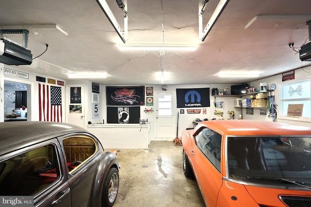 garage featuring a garage door opener