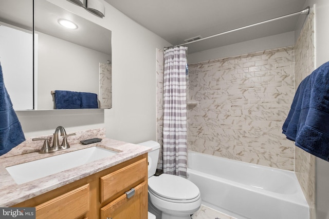 full bathroom featuring vanity, toilet, and shower / tub combo with curtain