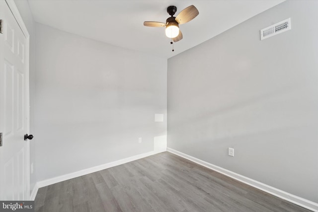 unfurnished room featuring ceiling fan and wood-type flooring