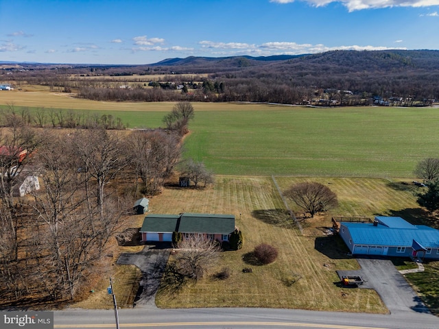 aerial view featuring a rural view and a mountain view