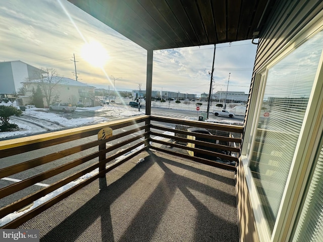 view of balcony at dusk