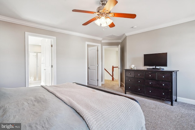 carpeted bedroom featuring crown molding and ceiling fan