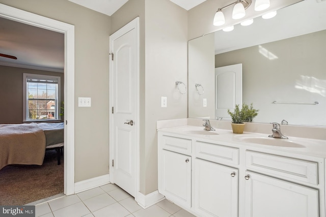 bathroom with ceiling fan, vanity, and tile patterned flooring