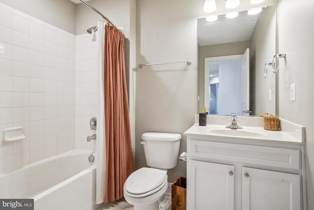 full bathroom featuring vanity, toilet, and shower / bath combo with shower curtain