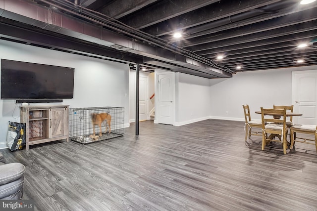 basement with wood-type flooring