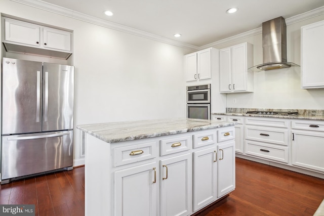 kitchen featuring a kitchen island, dark hardwood / wood-style floors, white cabinetry, stainless steel appliances, and wall chimney range hood