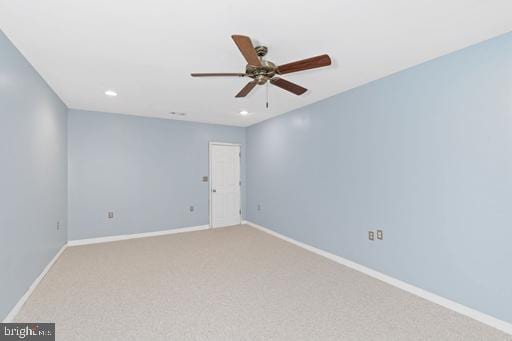 carpeted empty room with ceiling fan