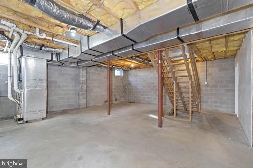 basement featuring heating unit