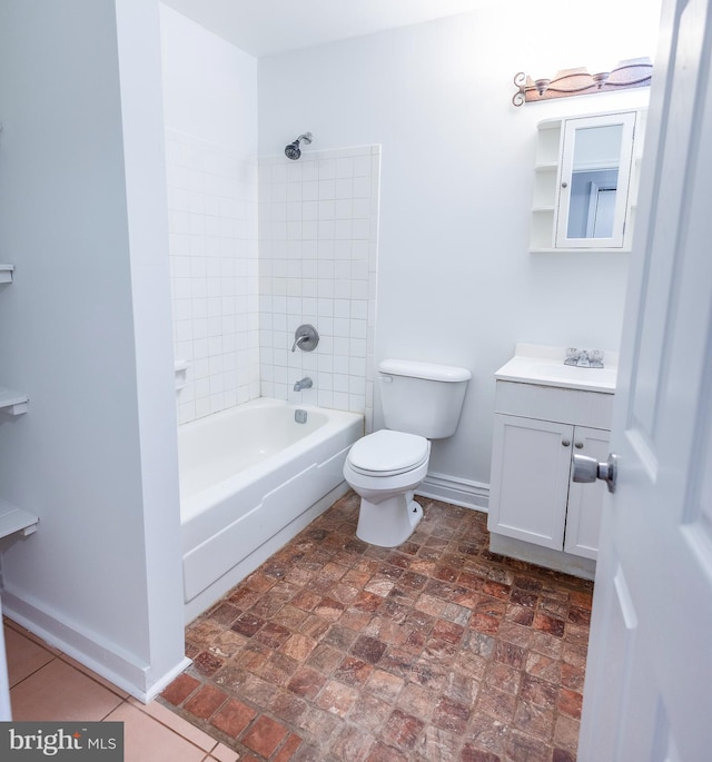 full bath with vanity, shower / bathing tub combination, toilet, and baseboards