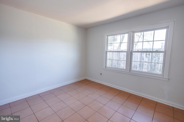 empty room with baseboards