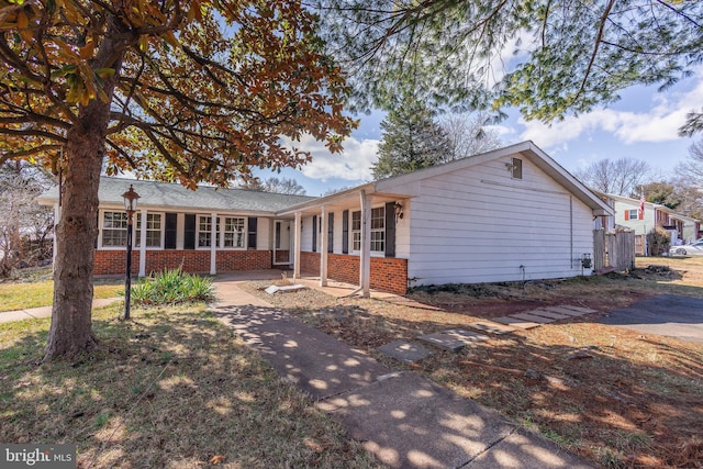 ranch-style home with brick siding