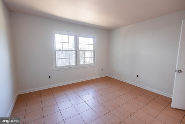 empty room with baseboards