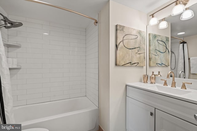 bathroom with shower / bathtub combination with curtain and vanity