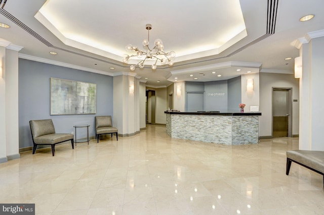 reception area with bar and a notable chandelier