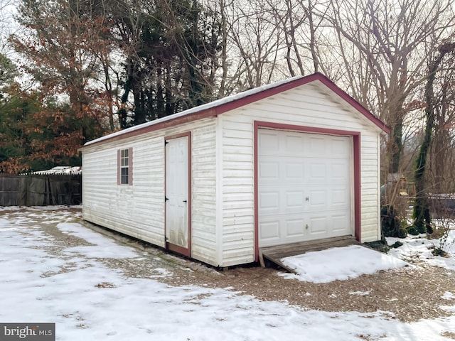 view of snow covered garage