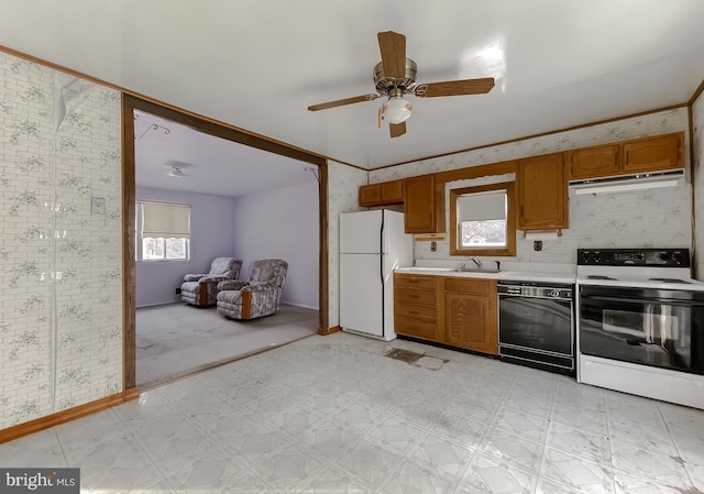 kitchen with sink, range with electric stovetop, white refrigerator, dishwasher, and ceiling fan