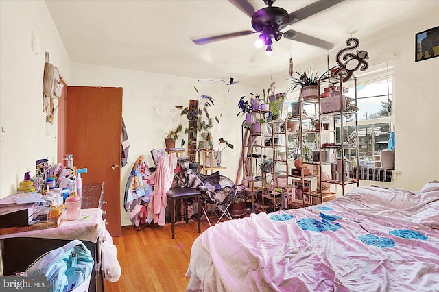 bedroom with hardwood / wood-style flooring