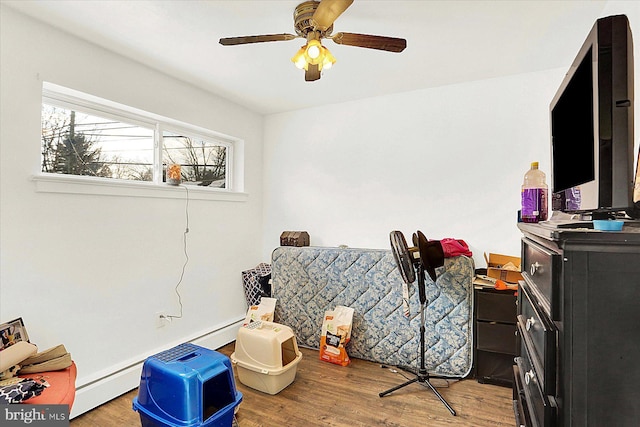 interior space with ceiling fan and light hardwood / wood-style flooring