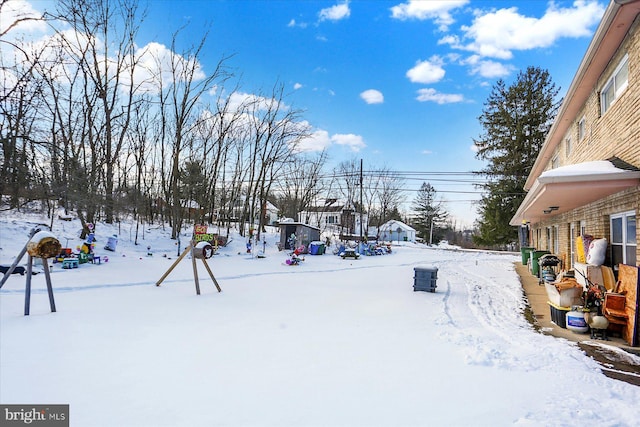 view of yard covered in snow