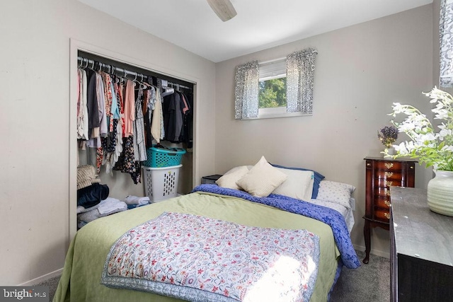 carpeted bedroom featuring a closet and ceiling fan