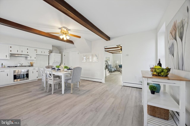 dining space featuring beamed ceiling, a baseboard radiator, ceiling fan, and light hardwood / wood-style floors