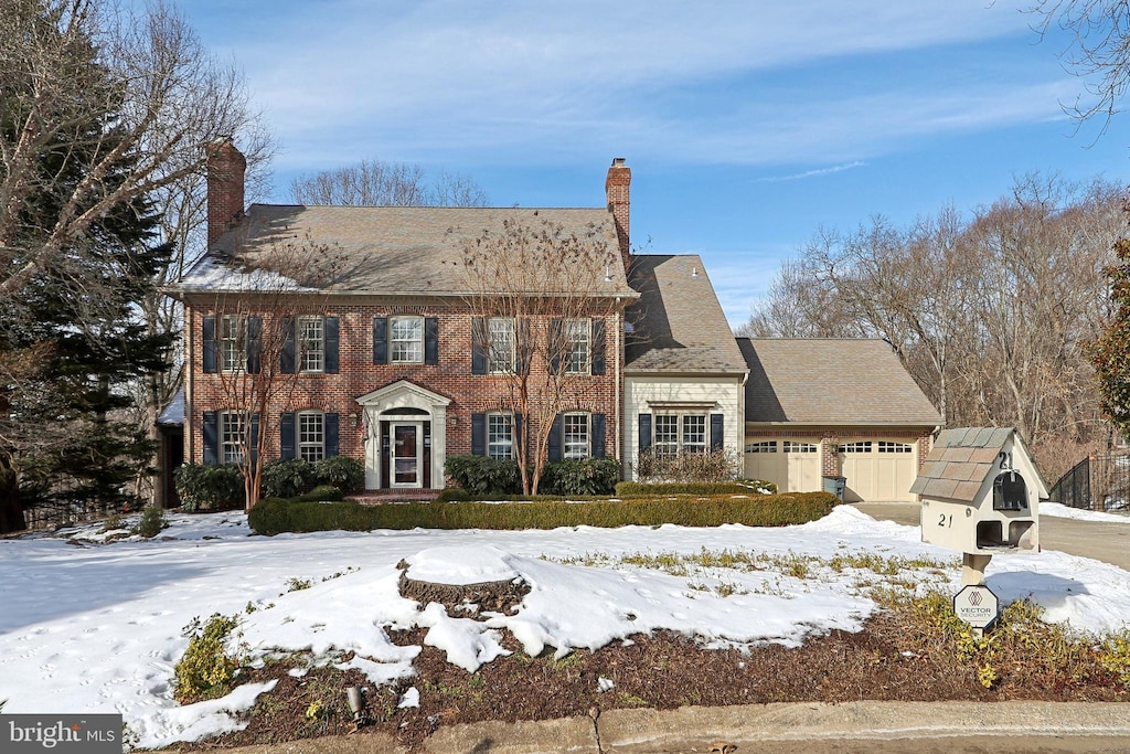 colonial home featuring a garage