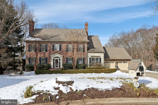 colonial home featuring a garage