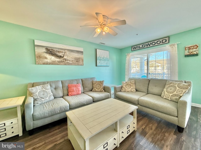 living room with dark hardwood / wood-style floors and ceiling fan