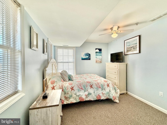 bedroom featuring ceiling fan and carpet flooring