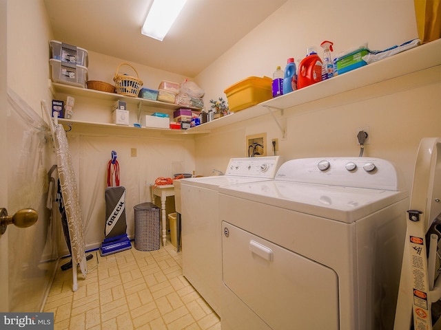 laundry room with washer and dryer