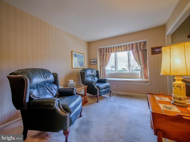 living area with carpet flooring