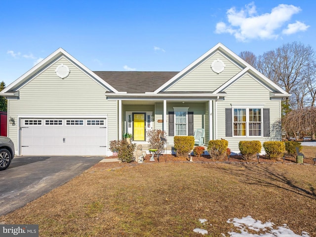 ranch-style home featuring a garage and a porch