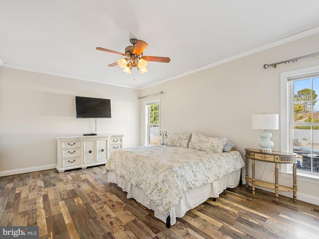 bedroom with multiple windows, ornamental molding, and dark hardwood / wood-style floors