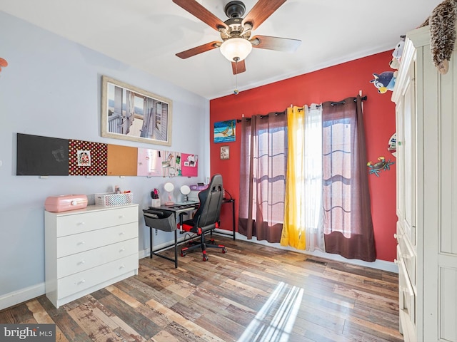 office area with hardwood / wood-style flooring and ceiling fan