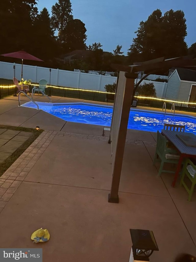 view of pool with a patio