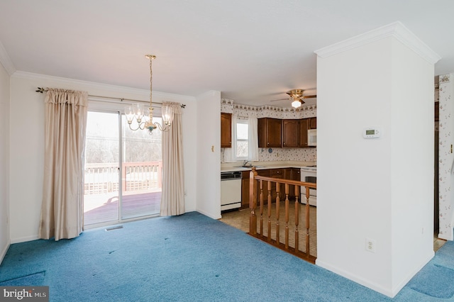 kitchen with white appliances, light colored carpet, visible vents, and a sink